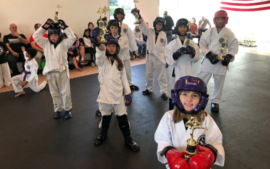 Kids sparring offers a safe environment to train and utilize skills from one martial artist to another.